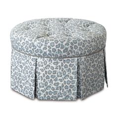 a blue and white leopard print ottoman