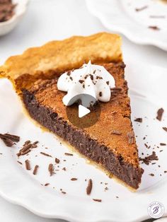 a slice of chocolate pie with whipped cream on top