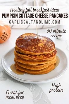 stack of pumpkin cottage cheese pancakes on a white plate