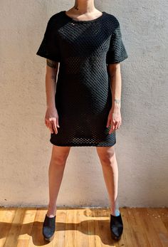 Black wool crochet/mesh/fishnet dress. Short bell-shaped sleeves. Emerson Frye.  51% Virgin Wool, 39% Polyester, 10% Acrylic.  Measurements:  Length: 36" Bust: 36" Waist: 37" Hips: 38" *measurements are taken seam to seam while lying flat.  *doubled for bust, waist and hips.  *model is a small/medium, around 5'8"  Follow along at @spaghetti_strap Fishnet Dress, Black Wool, Dress Clothes For Women, Spaghetti Strap, Labour Day, Art Collection, Dress Outfits, Bathing Beauties, Wool