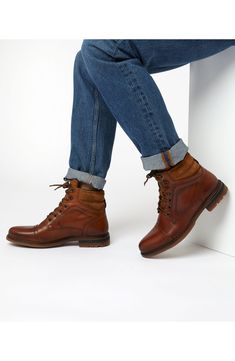 This smart lace-up boot combines the utilitarian treaded sole and cushioned heel of a traditional hiker style with the sophistication of a cap-toe derby. Leather upper/synthetic lining and sole Made in Portugal Redwing Boots, Workwear Boots, Mens Riding Boots, Hiker Style, Worker Boots, Wingtip Boots, Cap Toe Boots, Red Wing Boots, Dune London