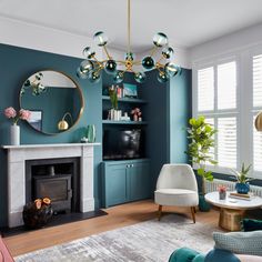 a living room filled with furniture and a fire place