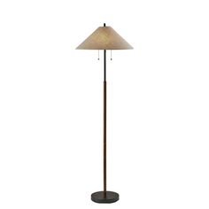 a floor lamp with a brown shade on the top and a white light on the bottom