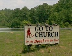 a sign that says go to church or the devil will get you in front of it