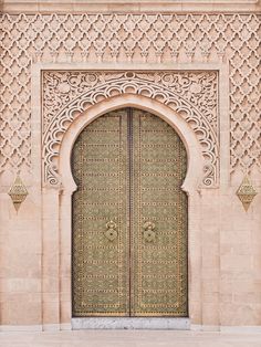 an ornate door with intricate carvings on it