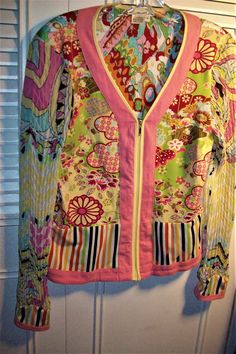 "A Florida look . Pink floral parfait by Lillie Rubin. Bust measures 36\", length 21\". LR is famous for her adorable creations. Stored with TLC. Comes from a smoke-free home. The sleeves are ruched in case the pictures do not show." Fitted Multicolor Floral Patchwork Tops, Fun Patchwork Tops For Spring, Fun Patchwork Spring Tops, Colorful Spring Tops With Fun Pattern, Colorful Fun Tops For Spring, Colorful Pattern Spring Tops, Pink Parfait, Womens Sweaters, Star Sweater