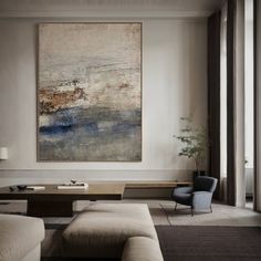 a living room filled with furniture and a painting on the wall