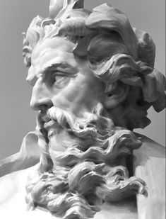 a statue of a man with long hair and beard