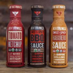 three bottles of hot sauce sitting next to each other on a wooden table with text overlay