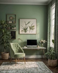 a living room with green walls and plants on the table in front of the window