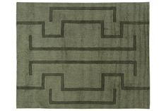 a green rug with black lines on it