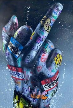 a painting of a hand with graffiti on it's fingers in front of a wall