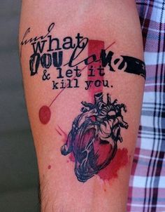 a man with a tattoo on his arm that says what you eat and let it kill you