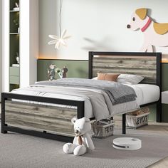 a bedroom with a bed, nightstands and a teddy bear on the floor in front of it