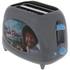 a toaster with an image of bob ross on the front and side panels is shown