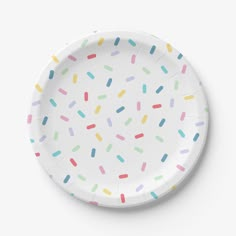 a paper plate with sprinkles on it