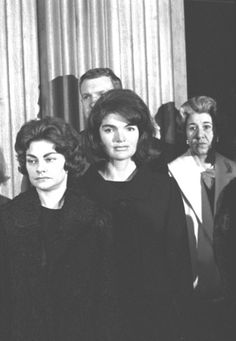 black and white photograph of people standing together