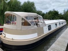 there is a boat that is docked at the dock