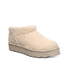 Bearpaw-Snuggle Daphne Bootie Enhance your winter look with the Snuggle Daphne bootie from Bearpaw. Faux fur upper and insole keep your feet warm all day long. This bootie is designed with layered EVA midsole for optimal support and Blown Rubber sole for maximal stability. Click here for Boot Measuring Guide. Winter Sherpa Boots, Winter Shearling Slippers With Textured Footbed, Bear Paw Boots, Bearpaw Mini Boots, Womens Reebok, Slouched Boots, Adidas Fashion, Bearpaw Boots, Hush Puppies