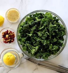 the ingredients for this salad include kale, lemons, and dressing