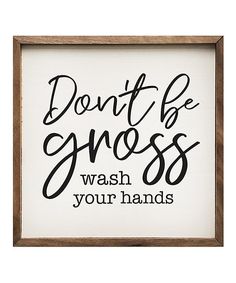 a framed sign that says, don't be gross wash your hands on it