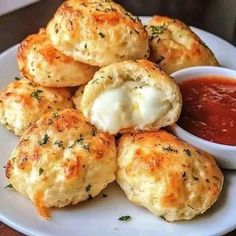 some biscuits and sauce on a white plate