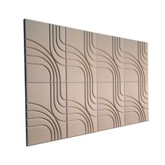 a close up of a tile wall with wavy lines on the back and side of it