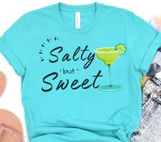 Salty but Sweet Shirt, Margarita Shirt, Tequila Shirt, Party Shirt, Vacation Shirt, Vacation Gift, Birthday Shirt, Birthday Gift, Margarita Gift, Friends Vacation This classic unisex jersey short sleeve tee fits like a well-loved favorite. Soft cotton and quality print make users fall in love with it over and over again. These t-shirts have-ribbed knit collars to bolster shaping. The shoulders have taping for better fit over time. Dual side seams hold the garment's shape for longer.  .: 100% Air Blue Summer Shirt With Funny Text, Summer Blue Shirt With Funny Text, Blue Shirt With Funny Text For Summer, Blue Funny Text Shirt For Summer, Summer Funny Print Shirt For Gift, Funny Print Shirt For Summer Gift, Funny Summer Tops As Gift, Green Summer Top For Birthday, Casual Green Shirt For Party