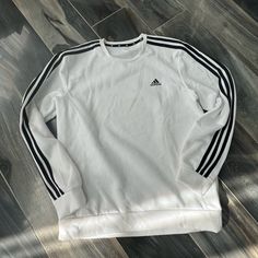 Adidas Mens Crewneck Sweatshirt Never Worn Size Large Perfect Condition Classic Crew Neck Top With Three Stripes, White Long Sleeve Sweatshirt With Three Stripes, Classic White Tops With Three Stripes, Classic White Top With Three Stripes, White Sports T-shirt With Ribbed Cuffs, White Crew Neck Top With Three Stripes, Casual Crew Tops With Three Stripes Branding, Casual White Sweatshirt With Three Stripes Branding, Classic White Crew Neck Sweatshirt