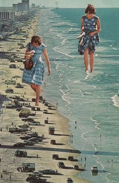 two girls are walking along the beach near the water