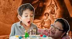 a boy blowing out candles on a birthday cake while an older woman looks at him