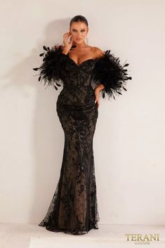 Step into the spotlight with the 241E2479 Asymmetrical Embroidered Off-Shoulder Trumpet Column Evening Dress. This gown is a harmonious blend of sophistication and allure, designed to make you the center of attention. Featuring a seductive off-shoulder neckline, a figure-hugging bodycon silhouette, and intricate embroidery on luxurious Point D’esprit fabric, this dress exudes timeless elegance. With color options in Black and Nude, you can opt for classic allure or understated chic. The addition of long sleeves offers a hint of modesty without compromising on allure. Elevate your evening with this extraordinary dress and make an unforgettable entrance. Luxury Fitted Off-shoulder Gown, Fitted Evening Dress With Asymmetrical Neckline For Gala, Fitted One-shoulder Embellished Evening Dress, Luxury Embellished Off-shoulder Evening Dress, Black Evening Dress With Asymmetrical Neckline For Wedding, Luxury Embellished Off-shoulder Dress, Luxury Off-shoulder Gown For Party, Off-shoulder Embellished Evening Dress, Nude Evening Dresses