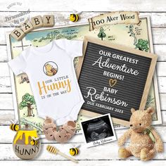 a baby announcement with a teddy bear and other items