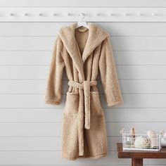 Get cozy after a warm bath or shower with this super-soft Sherpa robe. Full of style and comfort, this solid layer will make you feel like you're having an instant spa day. Plus, it's made entirely from recycled materials. KEY PRODUCT POINTS OEKO-TEX(R) STANDARD 100: tested for 1000+ harmful substances to keep you and your family safe from chemicals common to textile manufacturing. 14.HUS.42449 HOHENSTEIN HTTI. Made of 100% recycled polyester. Designed with a plush hood, 2 roomy pockets, sash be Cozy Super Soft Robe For Loungewear, Super Soft Long Sleeve Robe For Loungewear, Cozy Winter Overnight Robe, Cozy Winter Robe For Overnight, Cozy Robe For Loungewear, Cozy Relaxed Fit Robe For Lounging, Cozy Relaxed Fit Robe For Loungewear, Winter Loungewear Robe With Relaxed Fit, Cozy Relaxed Fit Robe For Relaxation