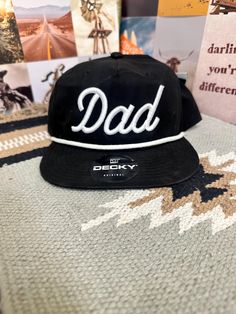 Popular Decky Brand "Dad" rope hat Cheap Dad Hat For Father's Day, Cheap Flat Bill Trucker Hat For Father's Day, One Size Fits Most Dad Hat With Letter Print, Father's Day Casual Adjustable Snapback Hat, Black Adjustable Hat, Fun Dad Hat For Streetwear, Dad Hat, Dad Hat With Letter Print, One Size Fits Most, Personalized Dad Hat One Size