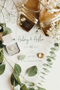 A birds eye view of a wedding detail shot including the invitation, rings, shoes and florals Wedding Detail Shots Invitation, Wedding Details Picture, Wedding Ring Detail Shots, Wedding Details Photos, Elope Locations, Wedding Details Photography Ideas, Ring Detail Shots, Wedding Ring Pics, Detail Shots Wedding