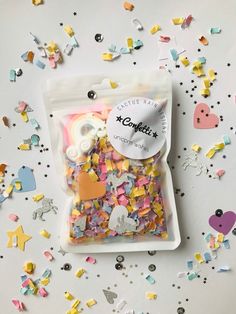 a bag of confetti mix sitting on top of a table