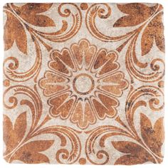 an orange and white tile with swirls on it