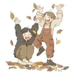 two children are playing with leaves in the air and one child is holding his hands up