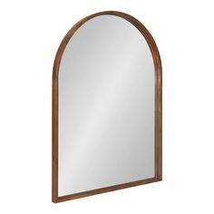 an arched wooden mirror on a white background