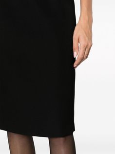 wool-blend pencil midi skirt from Versace featuring black, wool-silk blend, high waist, rear zip fastening, pencil silhouette and mid-length. Size Info IT Color Detail Black Made In Italy Material Exterior: 100% virgin wool Lining: Cupro 58%, Viscose 42% Season One Fall-Winter Season Two Fall-Winter Product skirts Brand Versace Size And Fit This piece fits true to size. We recommend you get your regular sizeModel is 1,75m / 5ft 8in wearing size 40 (IT) Office Wool Skirt In Black, Formal Black Wool Skirt, Elegant Wool Pleated Skirt, Modern Knee-length Formal Skirt, Modern Knee-length Skirt For Formal Occasions, Classic Relaxed Fit Pencil Skirt For Evening, Black Elastane Pencil Skirt For Formal Occasions, Elegant Wool Skirt For Office, Modern Black Pencil Skirt For Evening