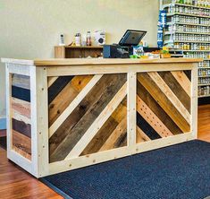 a counter made out of pallet wood in a store