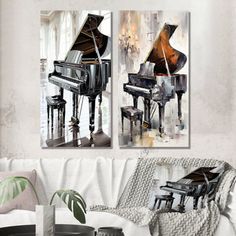 two paintings of piano and piano stools on the wall in a living room with white furniture