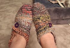 A pair of modern crochet slippers worn by a woman.