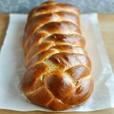 a loaf of bread sitting on top of a piece of paper