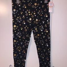 These Leggings Are A Size Xl For Girls, Which Is A Size 14/16. They Are Black With Various Sizes Of Gold And Silver Shimmery Stars That Cover The Front And Back Of The Leggings. They Are Made Of Tough Cotton And Are Very Durable. These Are Brand New With The Original Tags And Are In Excellent Condition. Size Girls Xl Star Leggings, Happy Pride Month, Glam Room, Happy Pride, Pride Month, Silver Stars, Kids Bottoms, Colorful Leggings, Gold And Silver