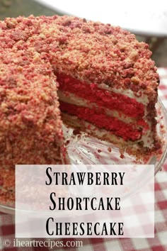 strawberry shortcake cheesecake on a plate with the words, strawberry shortcake cheesecake