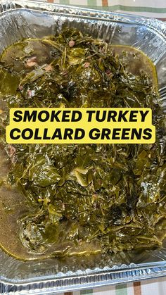 there is a tin foil container filled with cooked turkey and collard greens