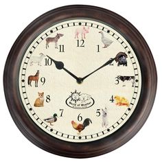 a clock with dogs on the face and numbers