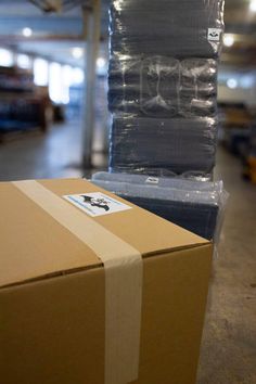 boxes stacked on top of each other in a warehouse